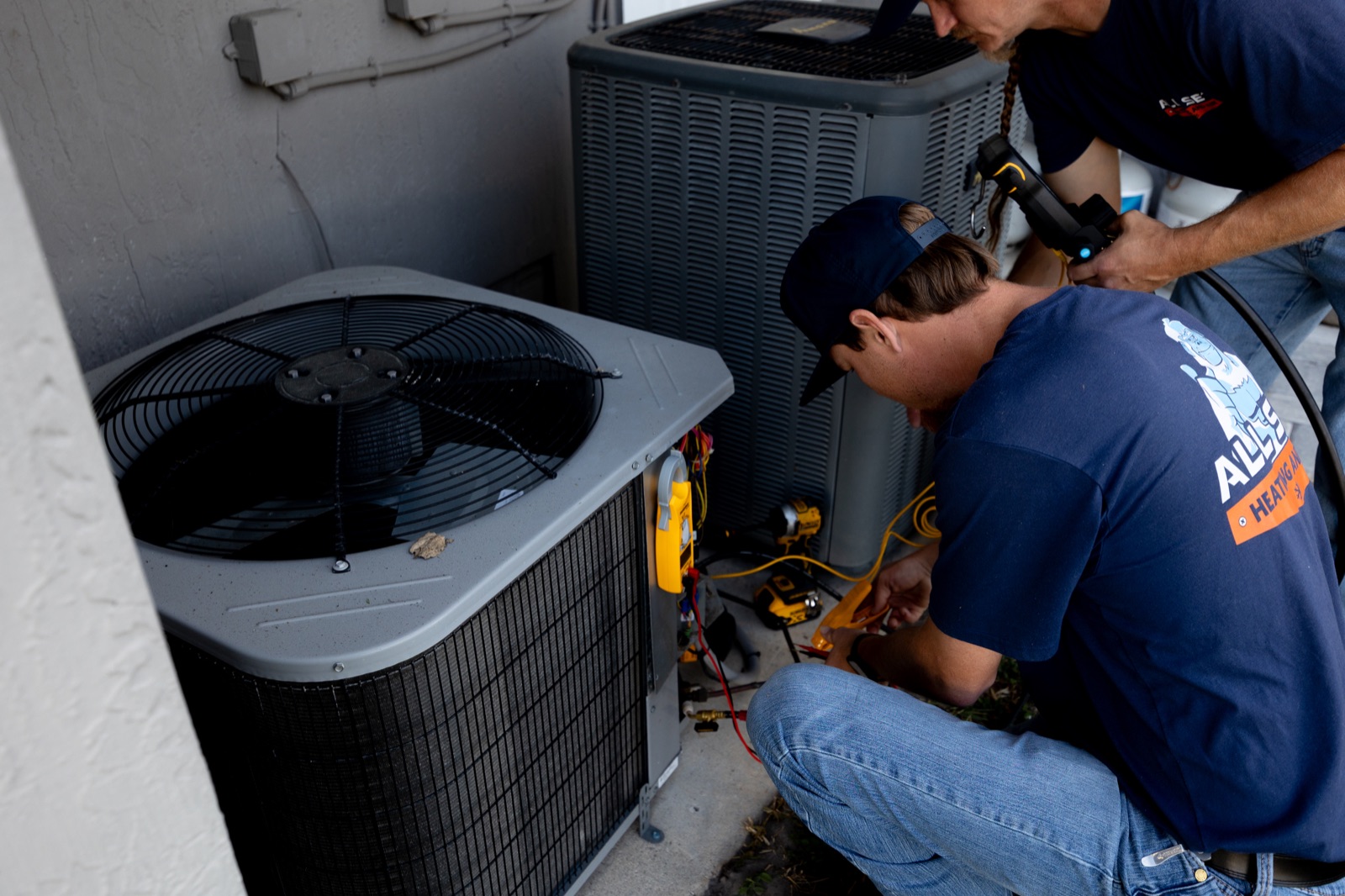 All Set HVAC technician servicing an AC unit in Jacksonville
